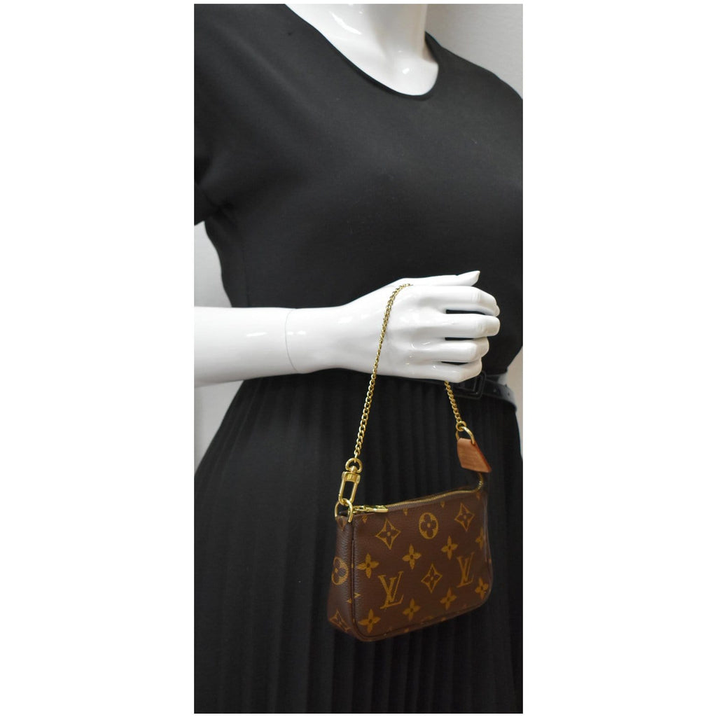 Pochette accessoire mini bag Louis Vuitton Brown in Cotton - 30578761