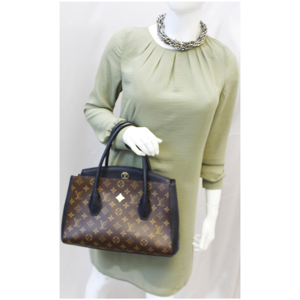 Florine leather handbag Louis Vuitton Brown in Leather - 24372237