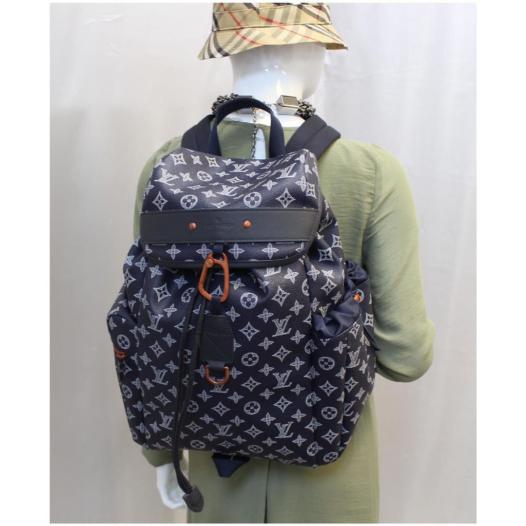 LOUIS VUITTON Monogram Upside Down Discovery Backpack 1209976