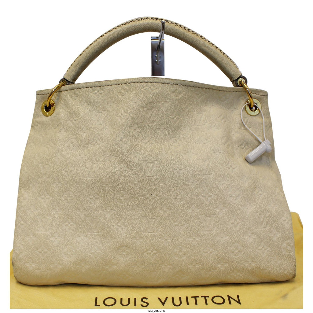 Louis Vuitton Artsy in white leather. Took this photo at the LV