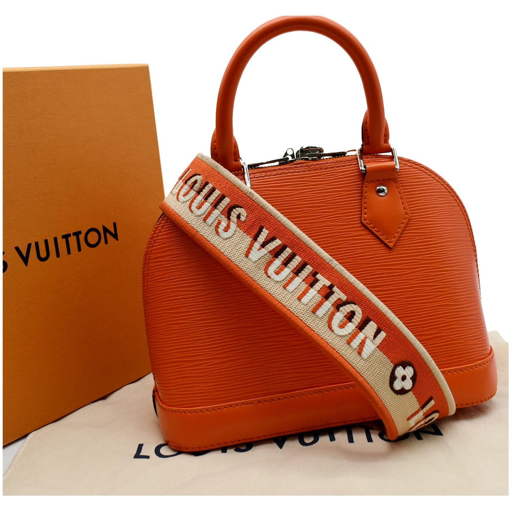 LOUIS VUITTON, an orange Epi leather 'Alma' bag. - Bukowskis