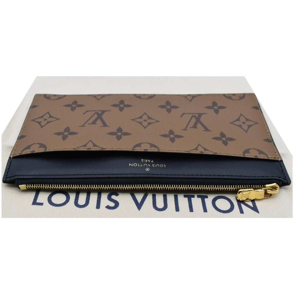 Louis Vuitton® Slim Purse Monogram Reverse. Size