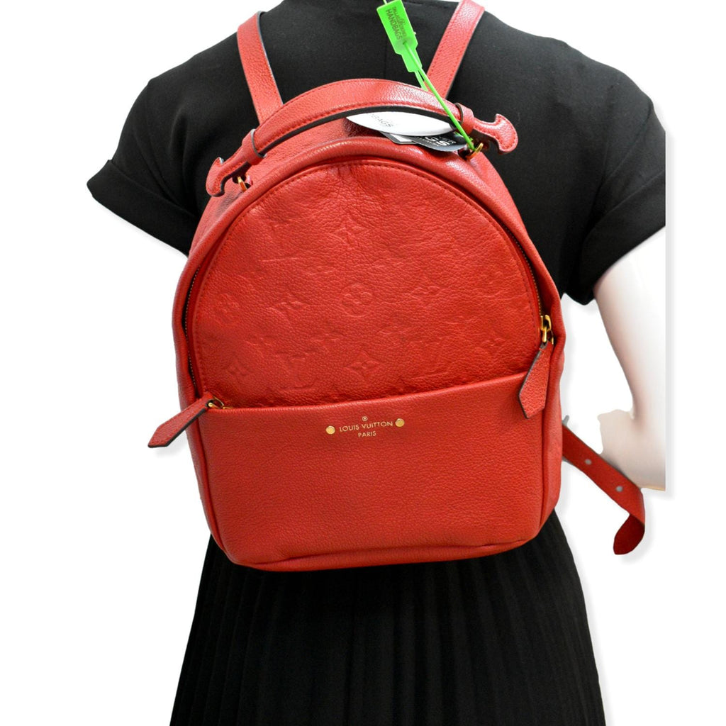 Leather backpack Louis Vuitton Red in Leather - 27871484