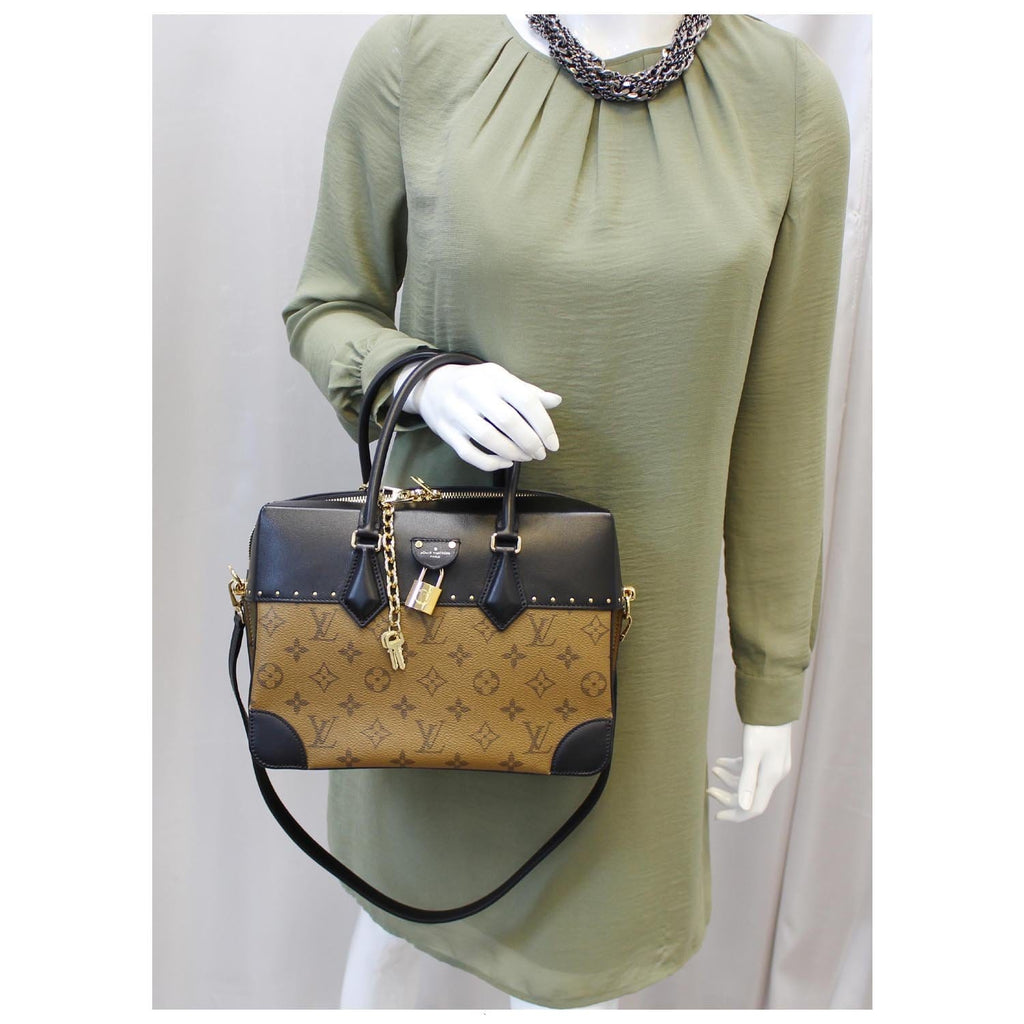 At Auction: Louis Vuitton, LOUIS VUITTON handbag CITY MALLE.