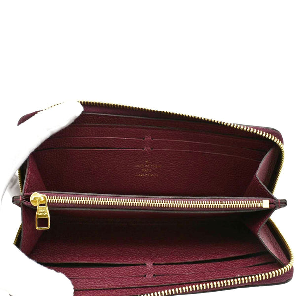 LOUIS VUITTON Clemence Empreinte Leather Wallet Maroon