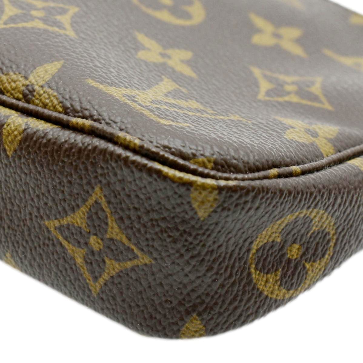 Pochette accessoire cloth clutch bag Louis Vuitton Brown in Cloth