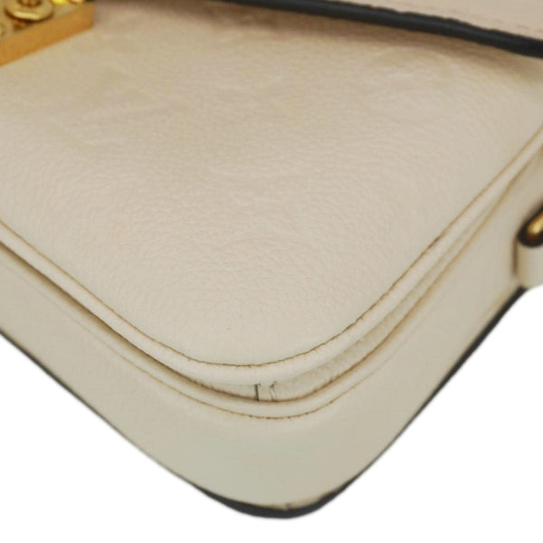 LOUIS VUITTON Metis East West Pochette Empreinte Leather Crossbody Bag Cream