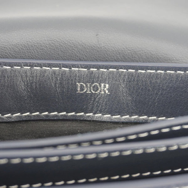 CHRISTIAN DIOR Saddle Leather Wristlet Navy Blue.