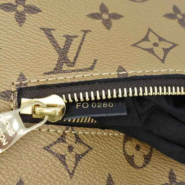 LOUIS VUITTON Metis Pochette Reverse Monogram Canvas Crossbody Bag Brown