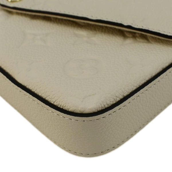 LOUIS VUITTON Felicie Pochette Empreinte Leather Crossbody Bag White