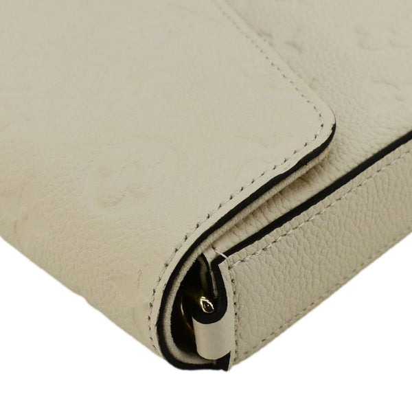 LOUIS VUITTON Felicie Pochette Empreinte Leather Crossbody Bag White