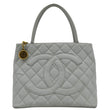 CHANEL Medallion Quilted Caviar Leather front look