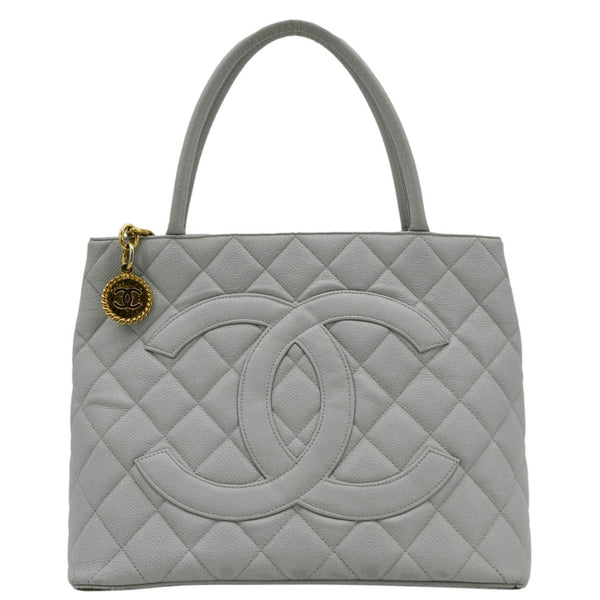 CHANEL Medallion Quilted Caviar Leather front look