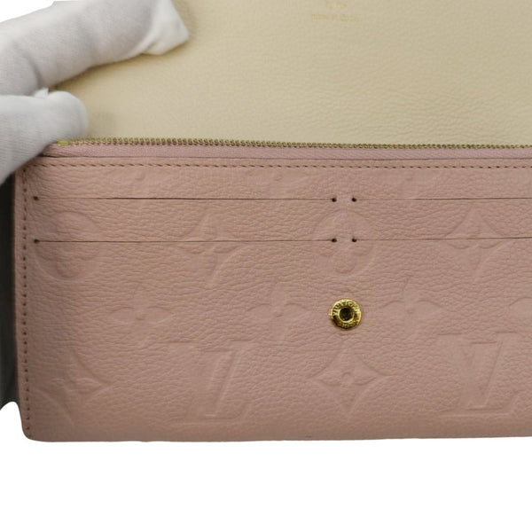 LOUIS VUITTON Sarah Monogram Empreinte Leather Wallet Pink