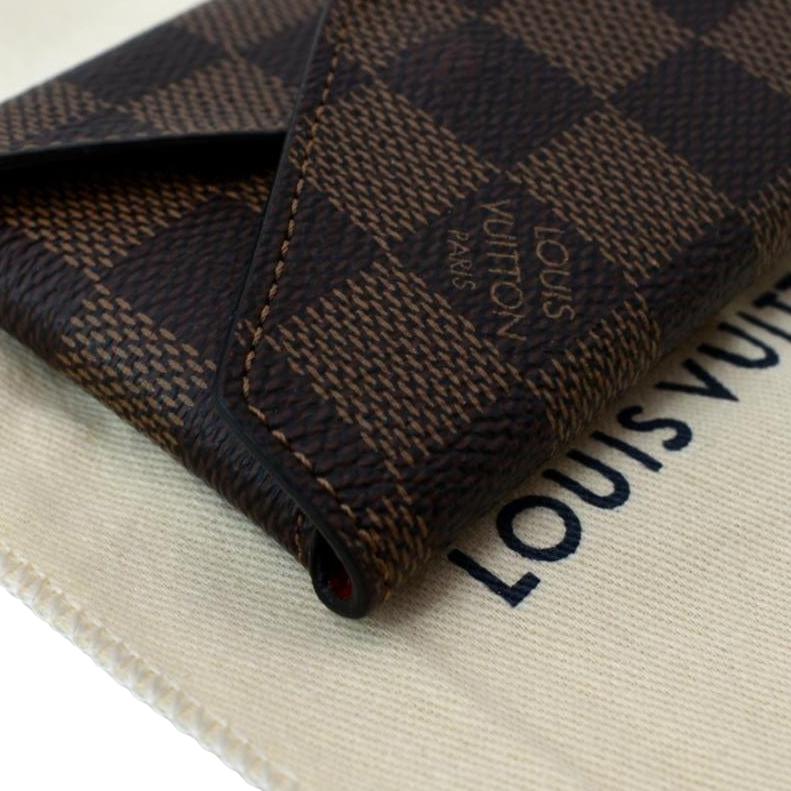 Kirigami vegan leather clutch bag Louis Vuitton Brown in Vegan