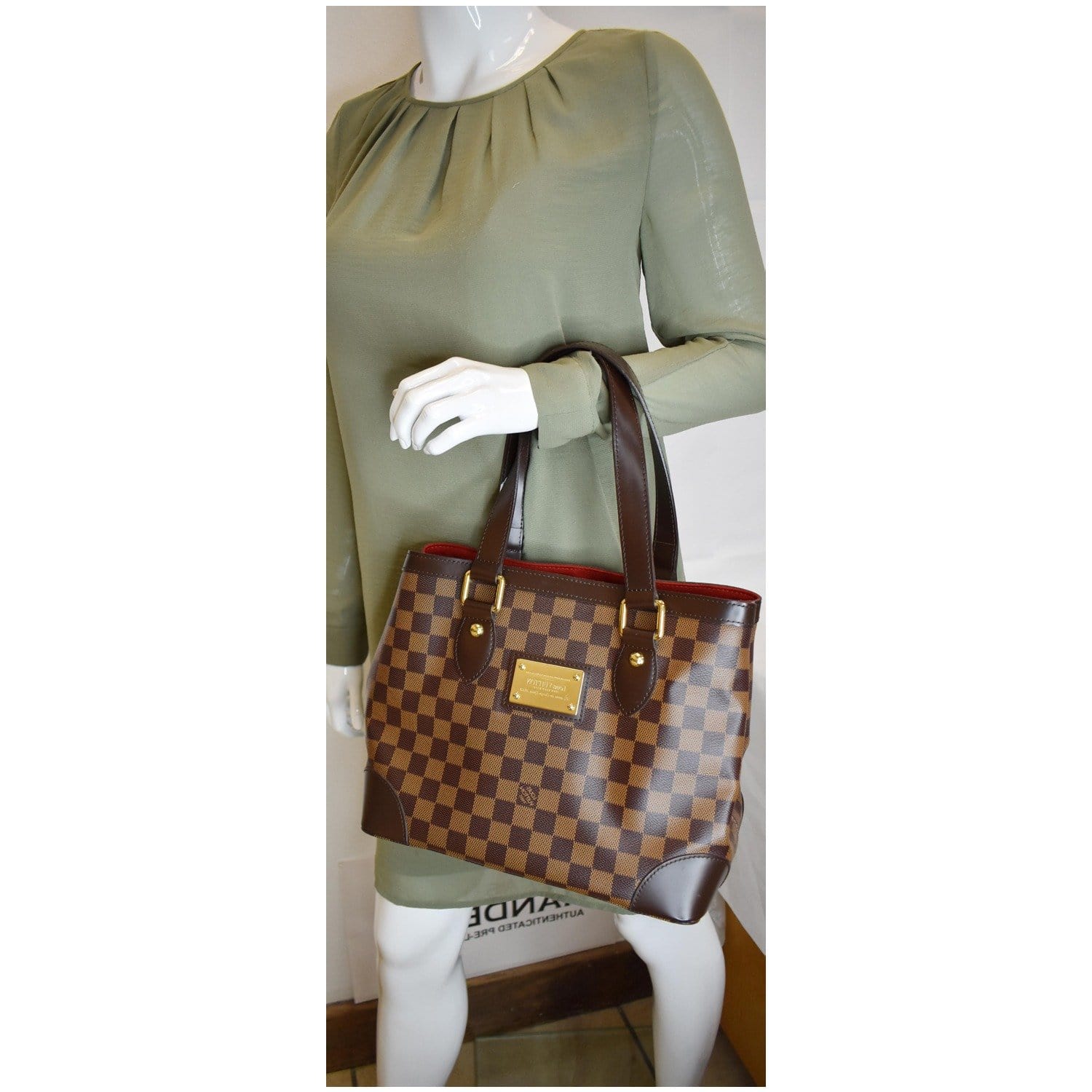 Louis Vuitton Hampstead Leather Handbag In Brown
