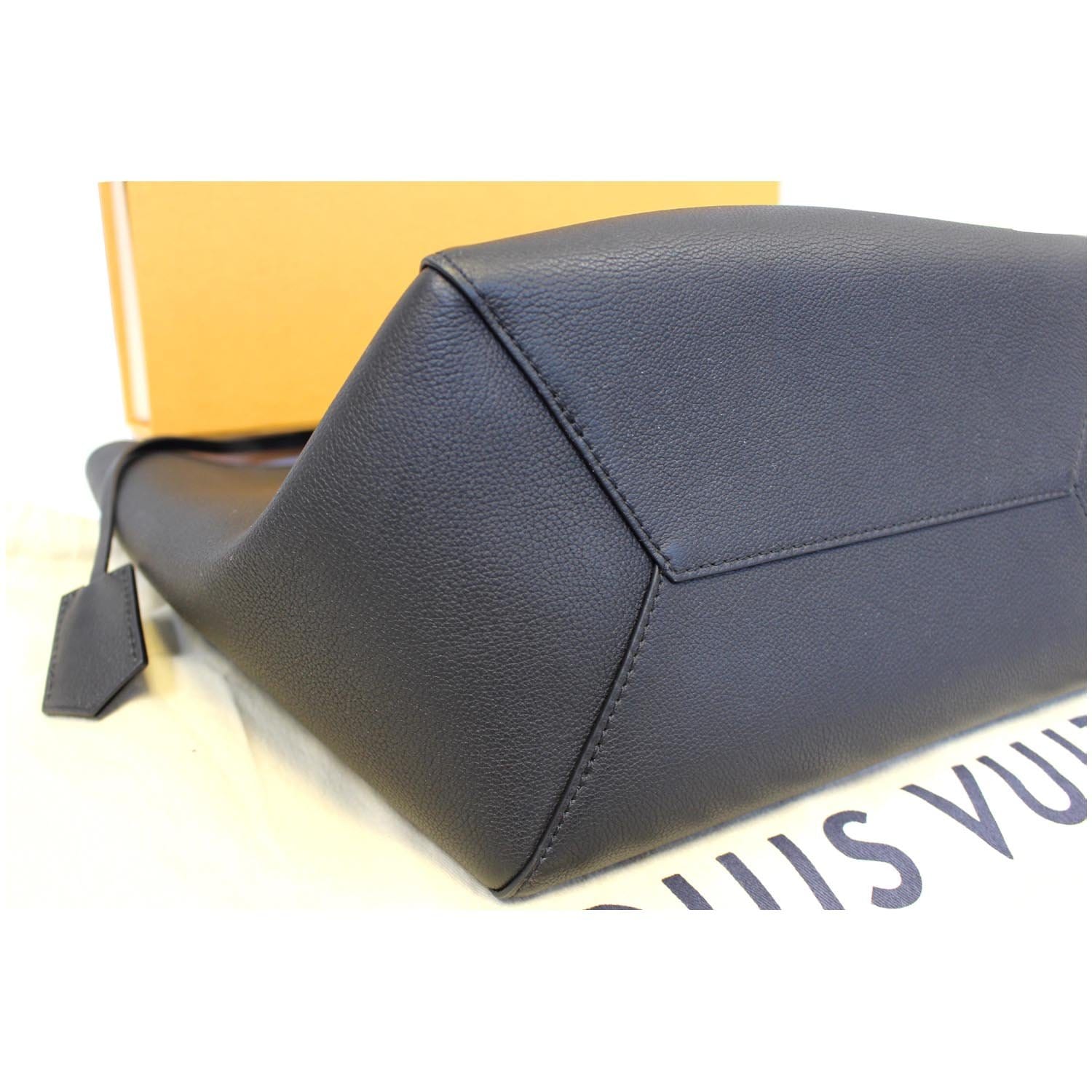 Lockme leather clutch bag Louis Vuitton Black in Leather - 29859080