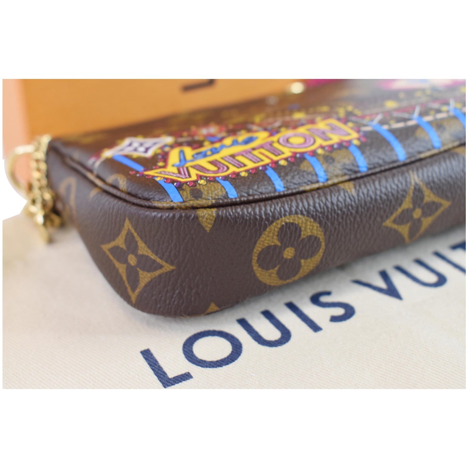Pre-loved authentic 2018 Christmas Louis Vuitton Mini Pochette