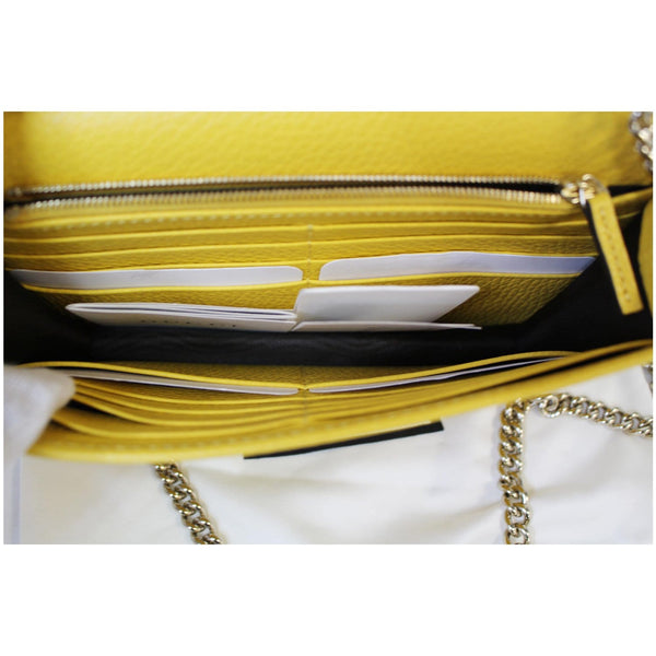 GUCCI GG Interlocking Pebbled Leather Crossbody Bag Yellow 615523