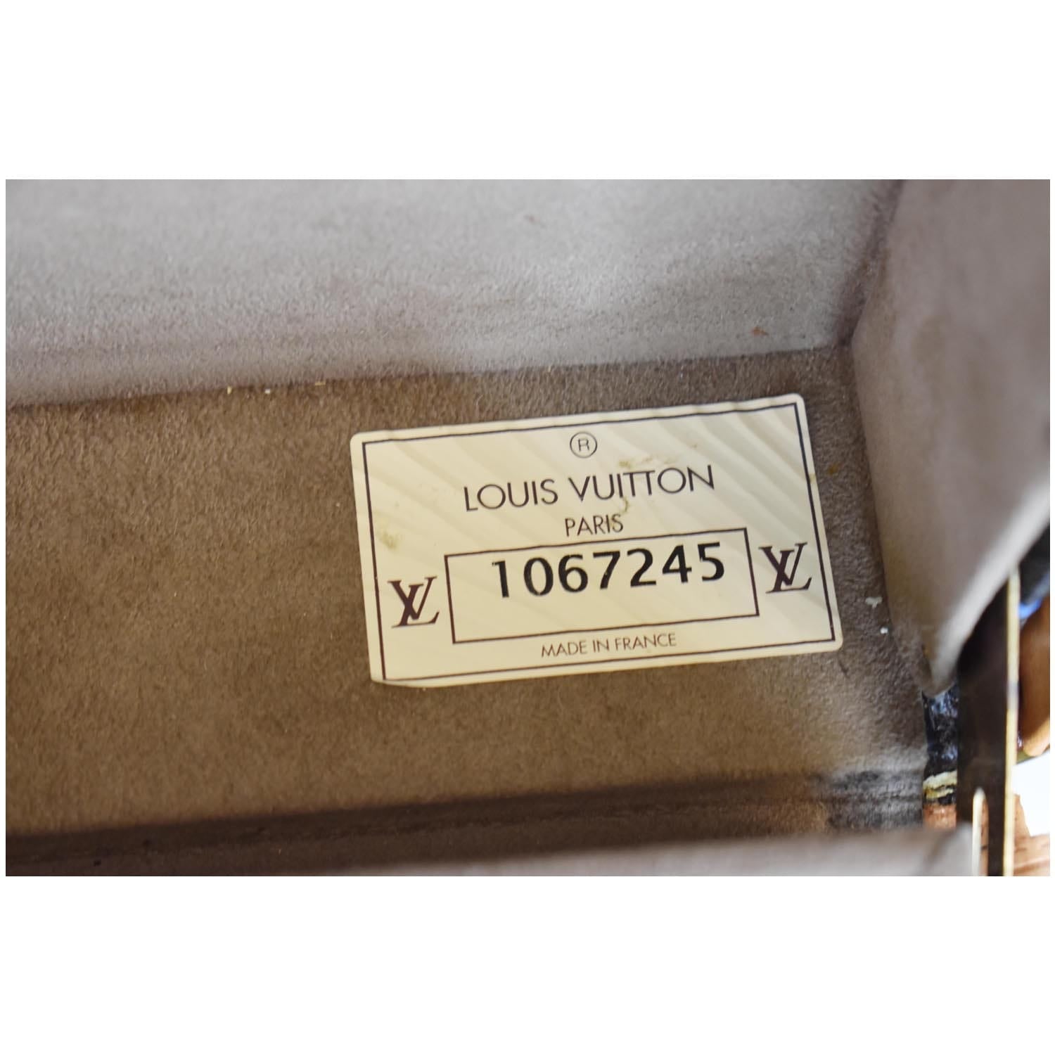 Valise Louis Vuitton modèle Alzer 80 monogrammé avec sa clé