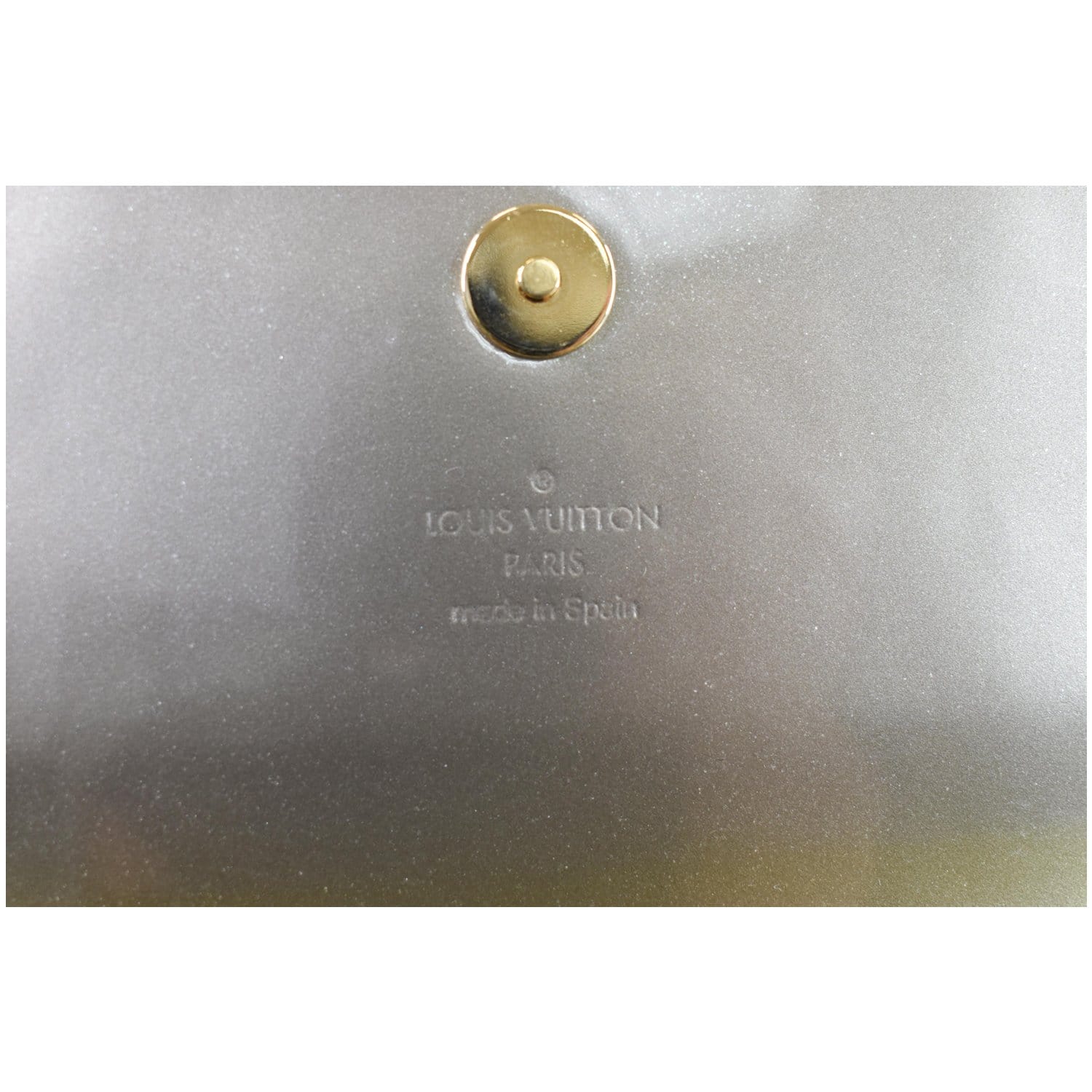 Sold at Auction: Louis Vuitton Amarante Vernis Leather Sobe Clutch