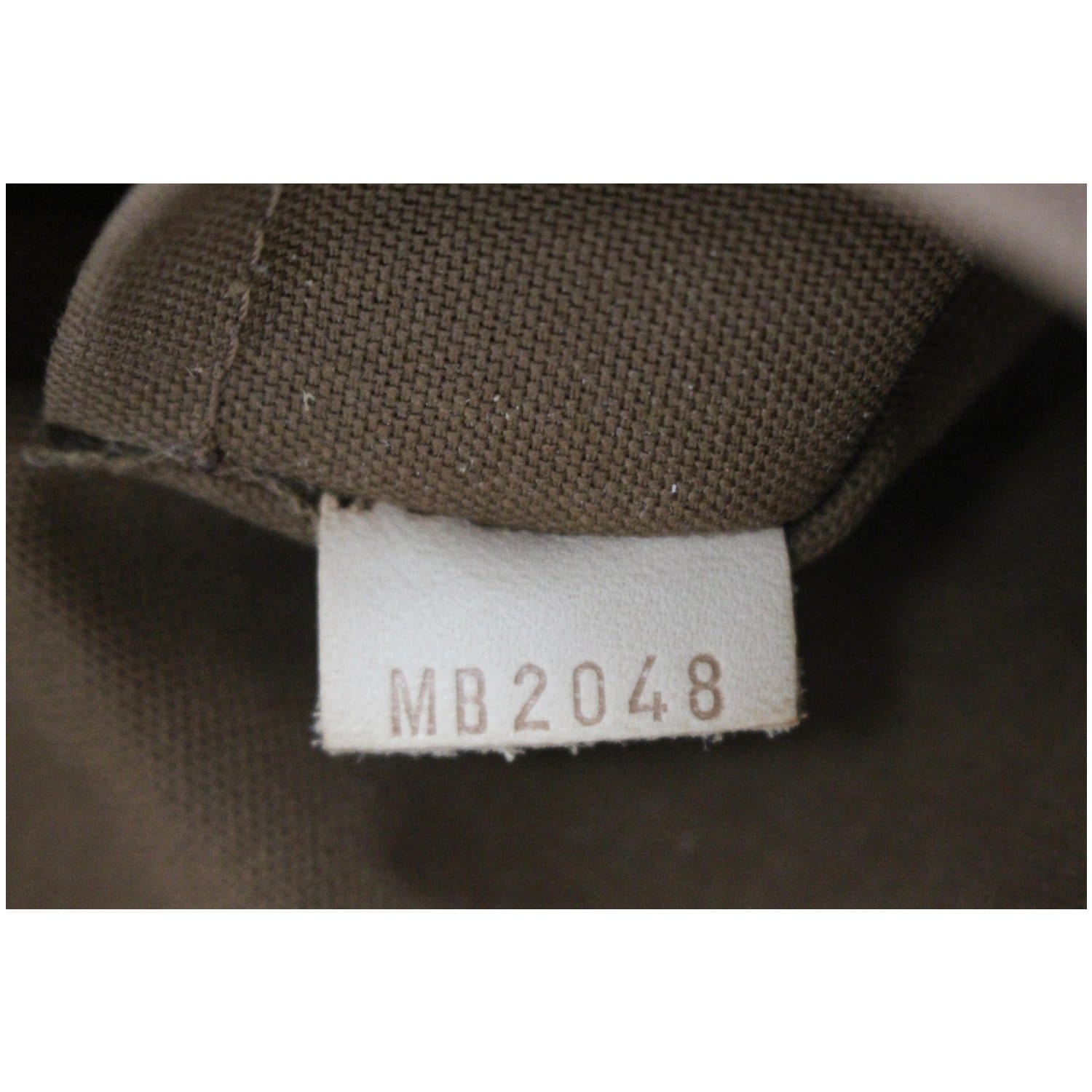 Louis Vuitton Brown Monogram Tulum GM Leather Cloth ref.129981 - Joli Closet