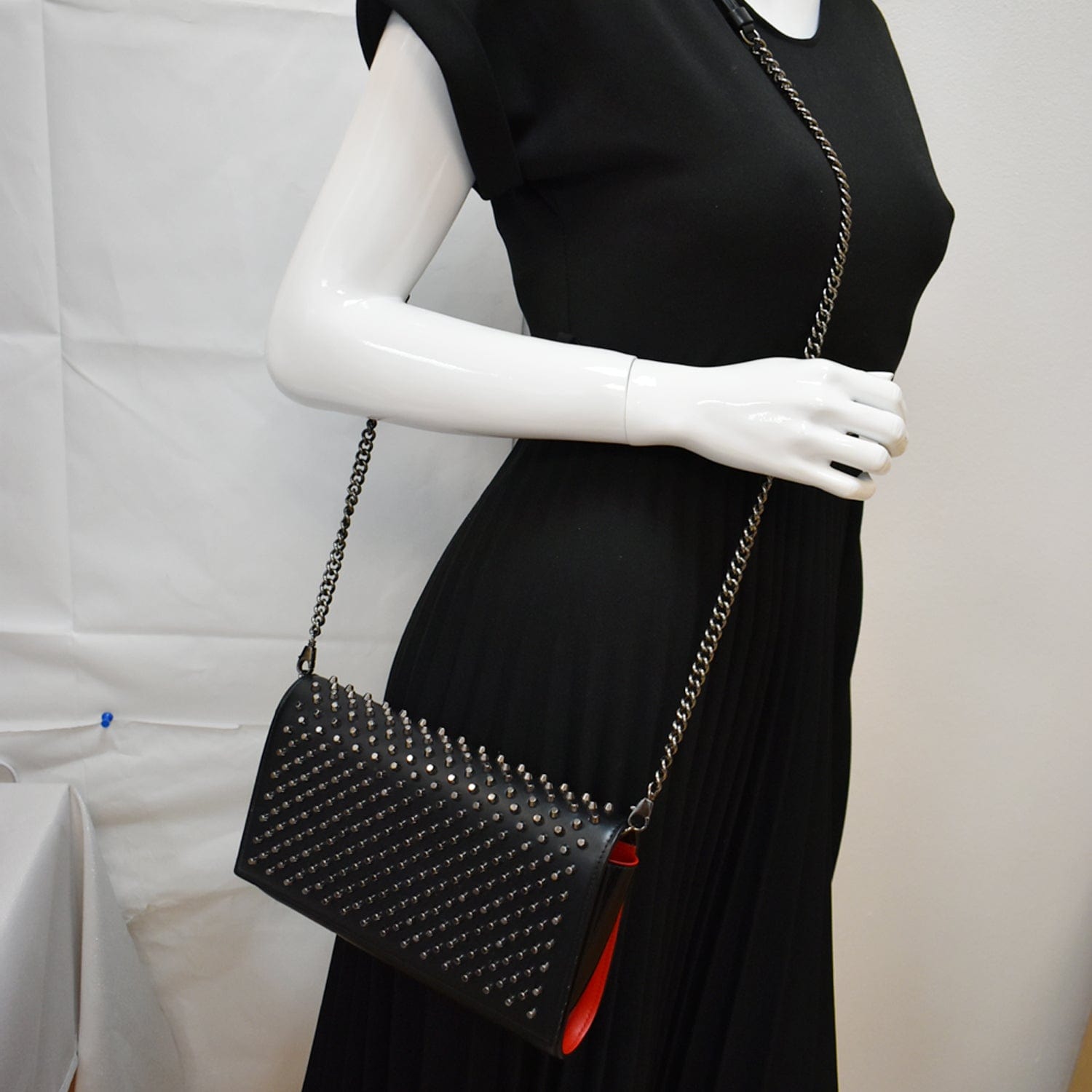 Black Paloma stud-embellished leather clutch bag