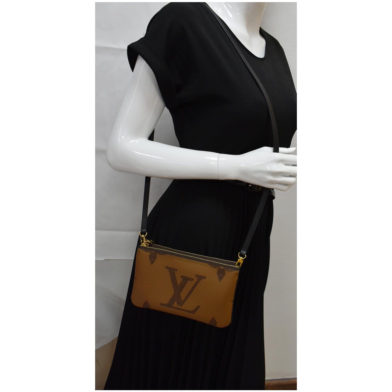 Louis Vuitton® Double Zip Pochette Monogram Monogram Reverse. Size