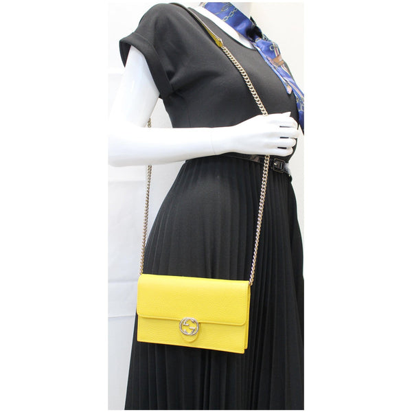 GUCCI GG Interlocking Pebbled Leather Crossbody Bag Yellow 615523