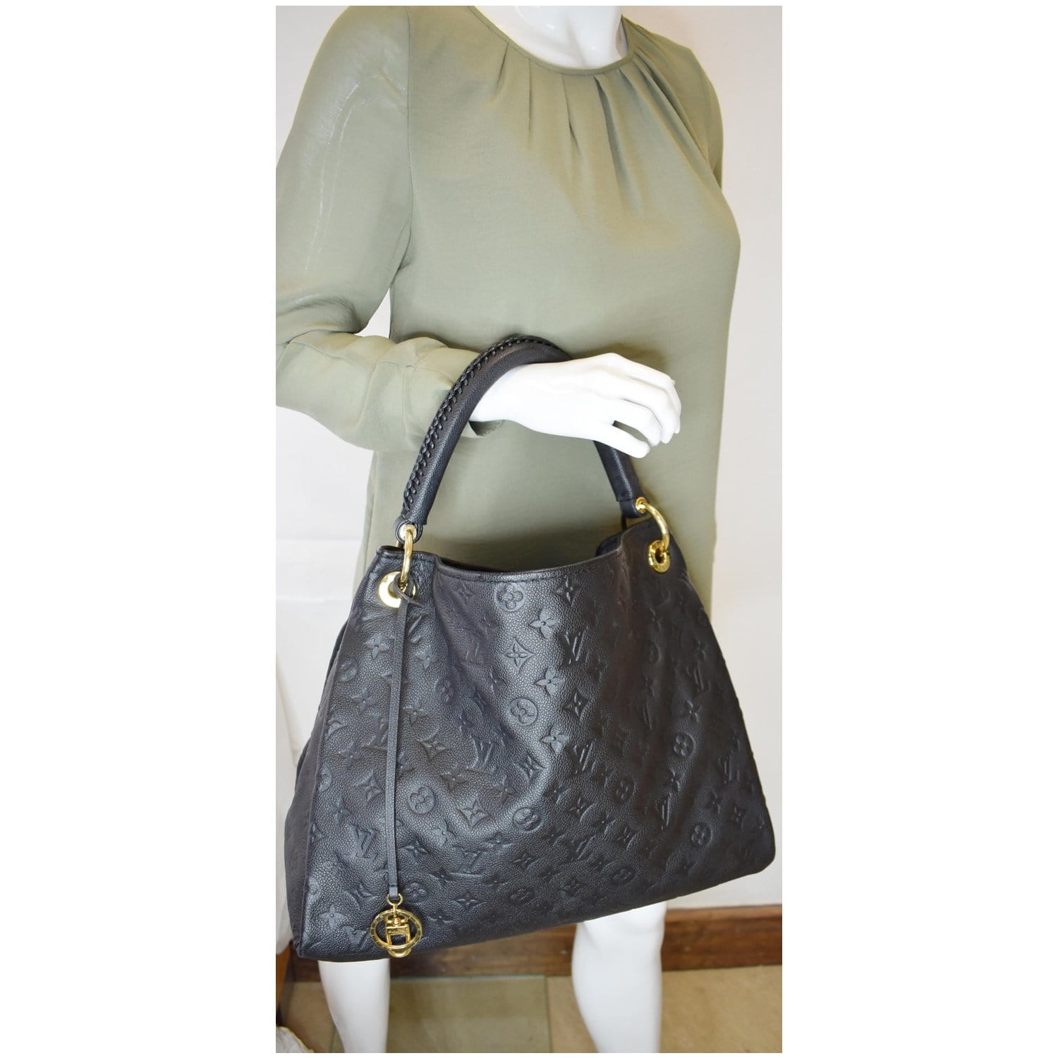 Discover Timeless Elegance: Louis Vuitton Artsy mm at Dress Raleigh
