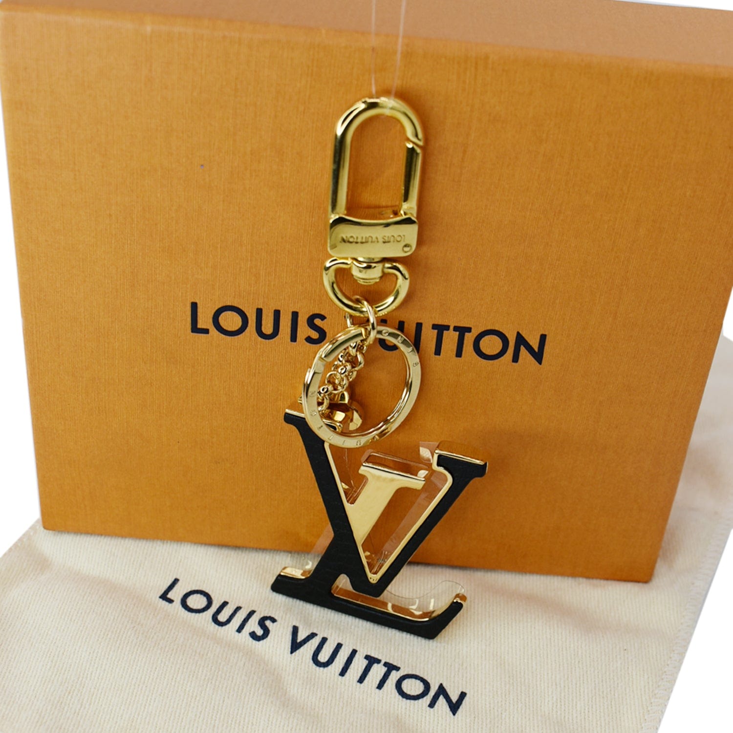 Shop Louis Vuitton Leather Logo Keychains & Bag Charms by