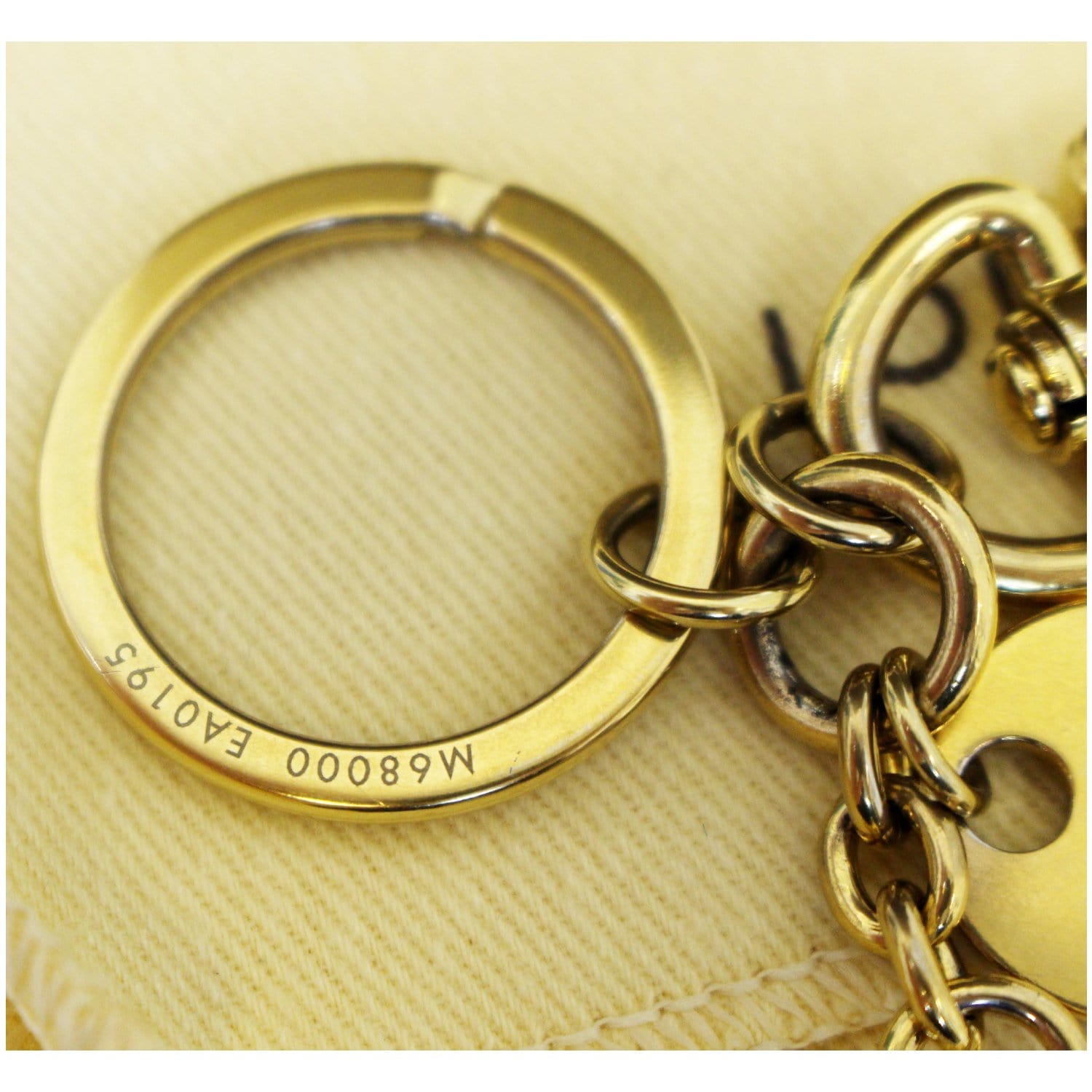 Louis Vuitton Bag charm key ring LV Circle gold good condition Authentic