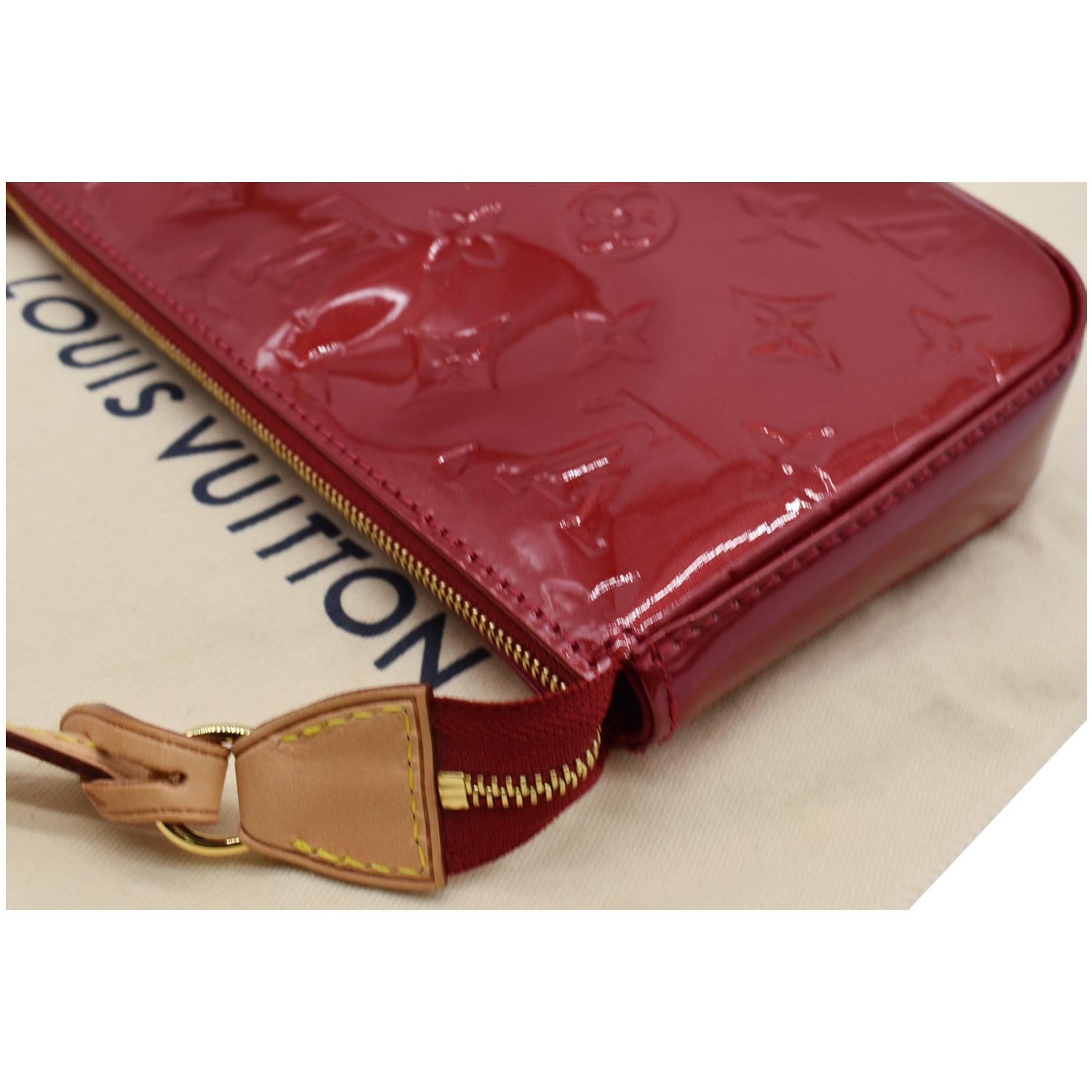 pochette accessoires monogram vernis leather