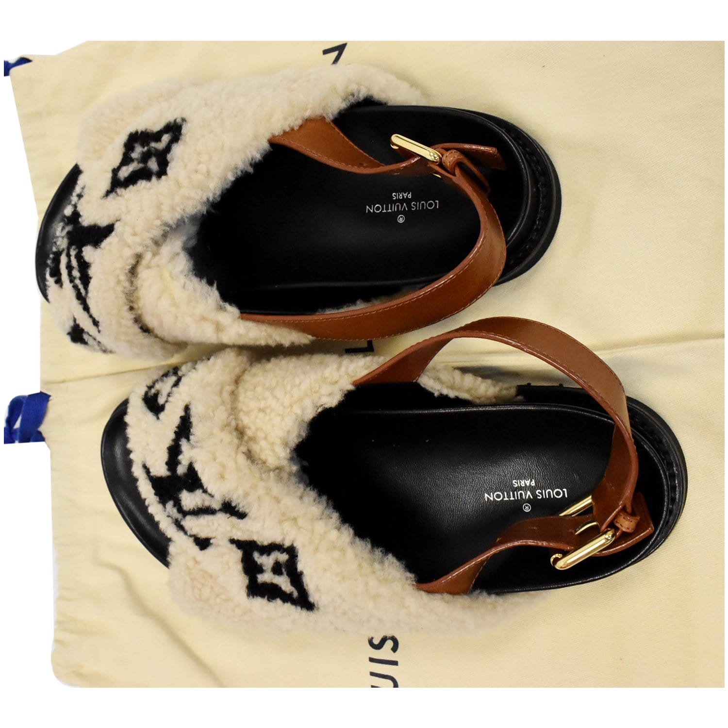 Shearling sandals Louis Vuitton Black size 37 EU in Shearling - 25399500