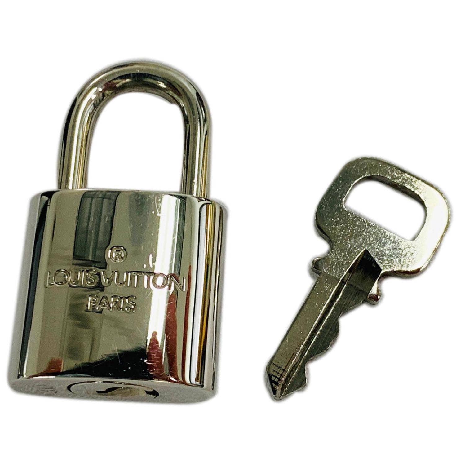Louis Vuitton, Bags, Louis Vuitton Silver Lock Key Set Cadena 448