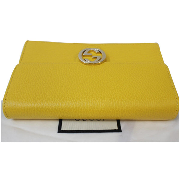 GUCCI GG Interlocking Pebbled Leather Crossbody Bag Yellow 615523