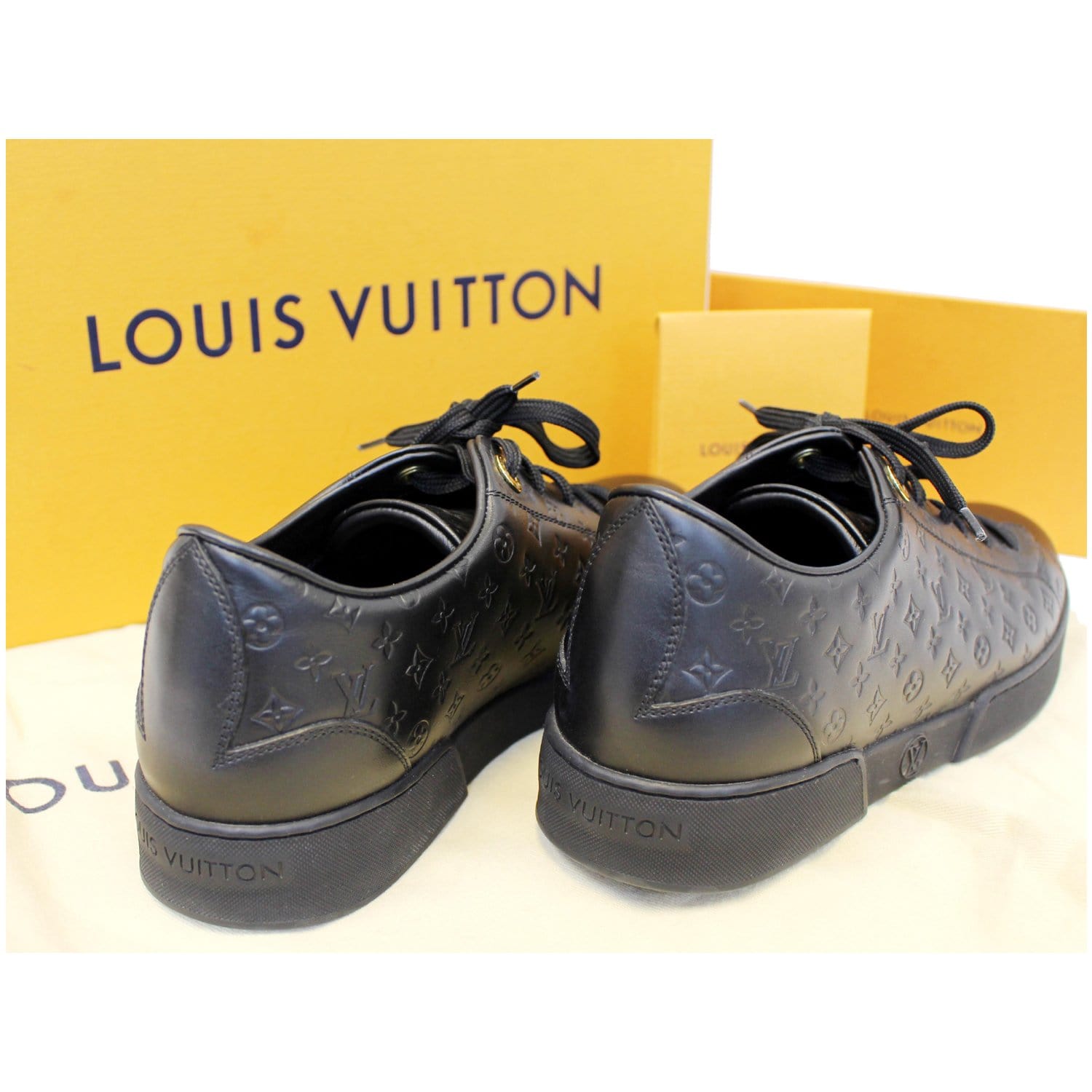 Louis Vuitton Monogram Embossed Lace Up Sneakers