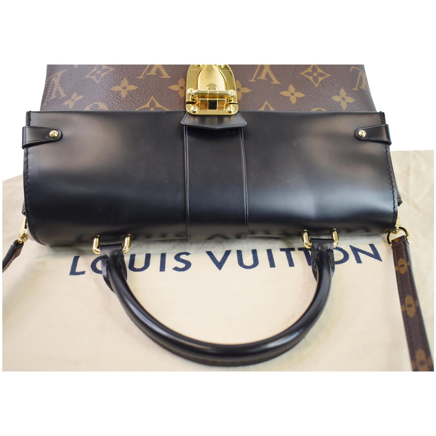 Louis Vuitton One Flap Handle MM Bag (3pcs) This sophisticated bag is