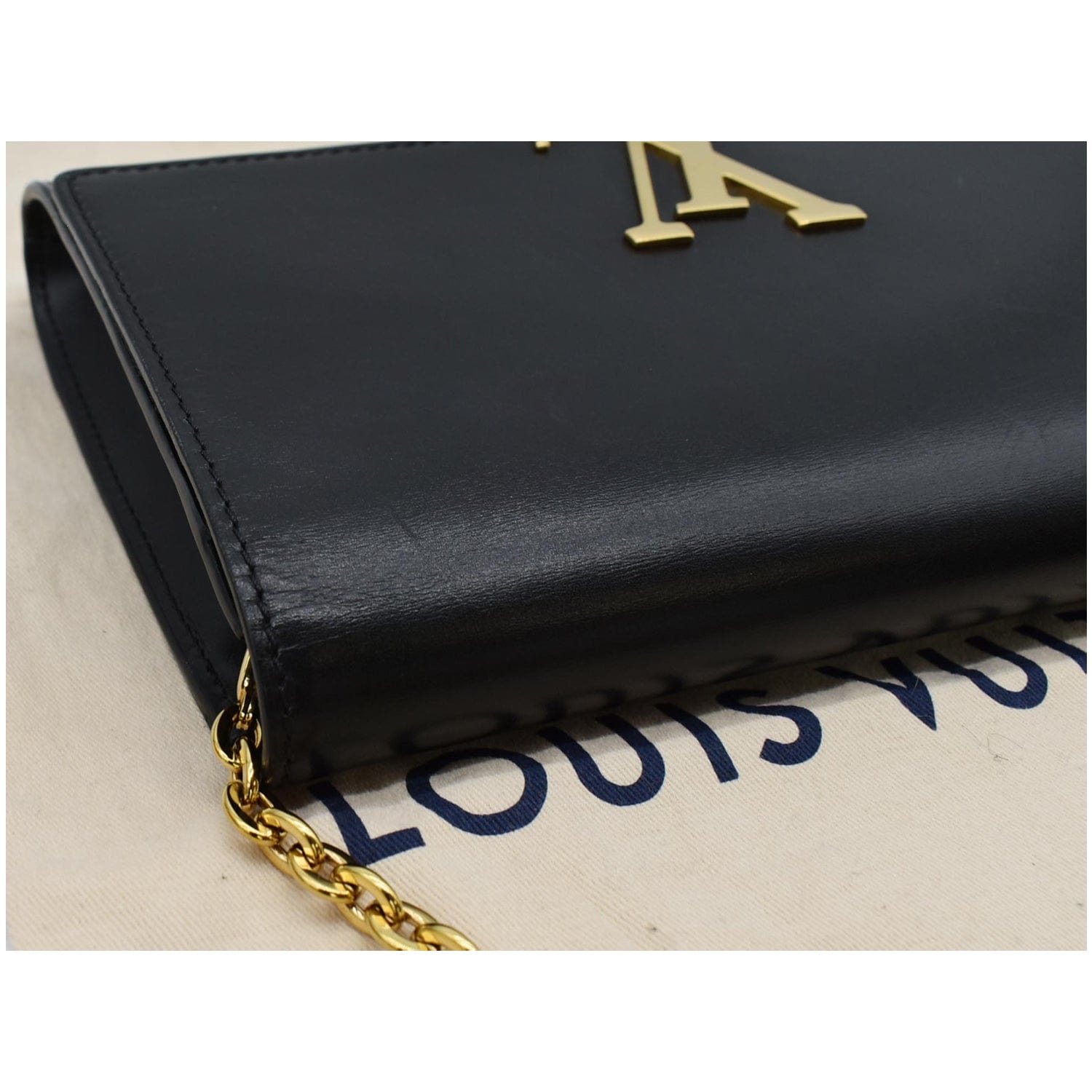 Louise leather phone charm Louis Vuitton Black in Leather - 31846356