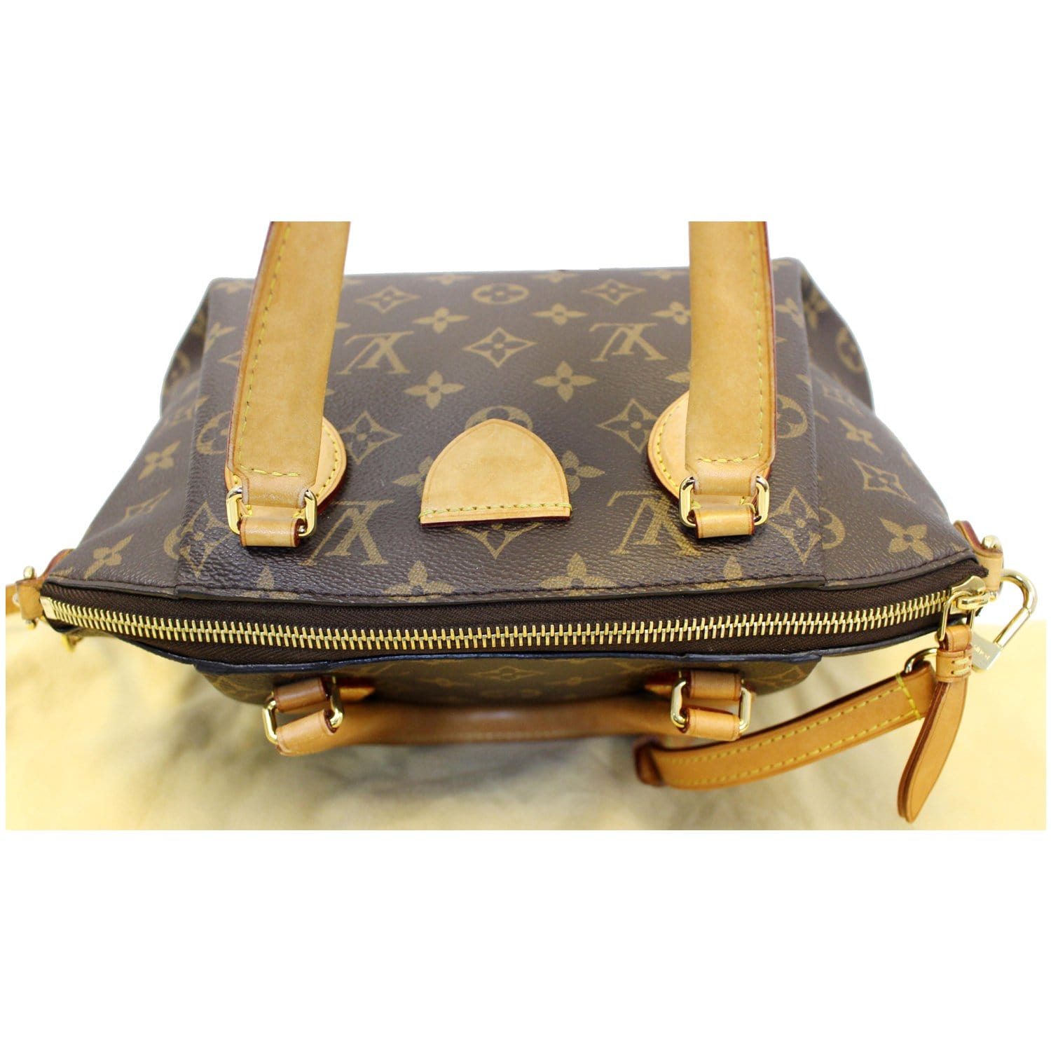Rivoli PM bag in brown monogram canvas Louis Vuitton - Second Hand / Used –  Vintega