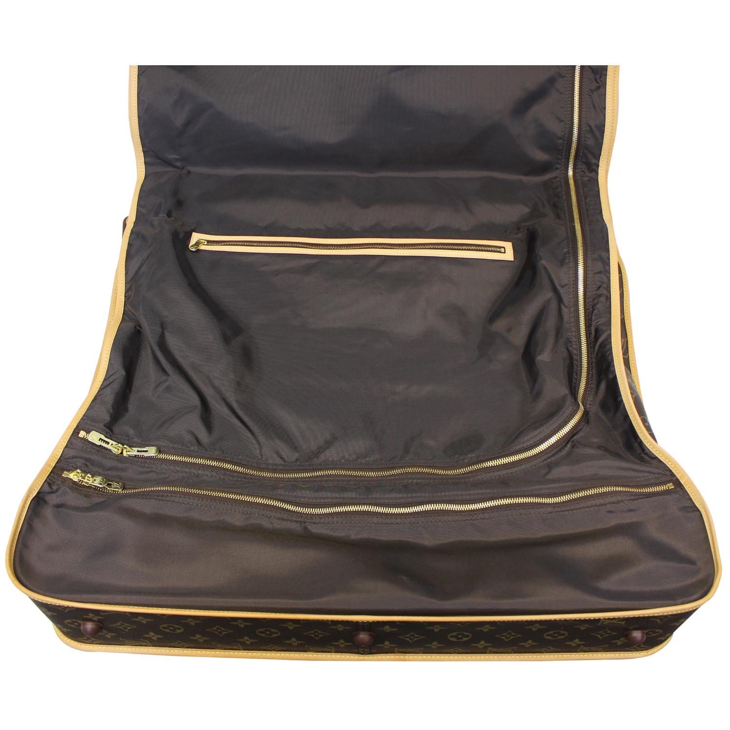 At Auction: Louis Vuitton, LOUIS VUITTON GARMENT BAG LUGGAGE WITH NATURAL  LEATHER TRIM. SAKS FIFTH AVENUE METAL TAG. FROM ESTAT