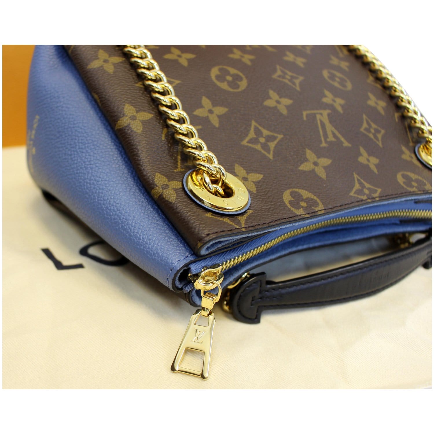 Oversized Louis Vuitton/Supreme handbag with blue handle by Norman