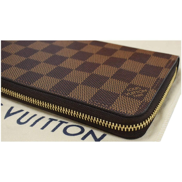 Louis Vuitton 2011 Pre-owned Damier Ebene ILLUSTRE Zippy Long Wallet - Brown