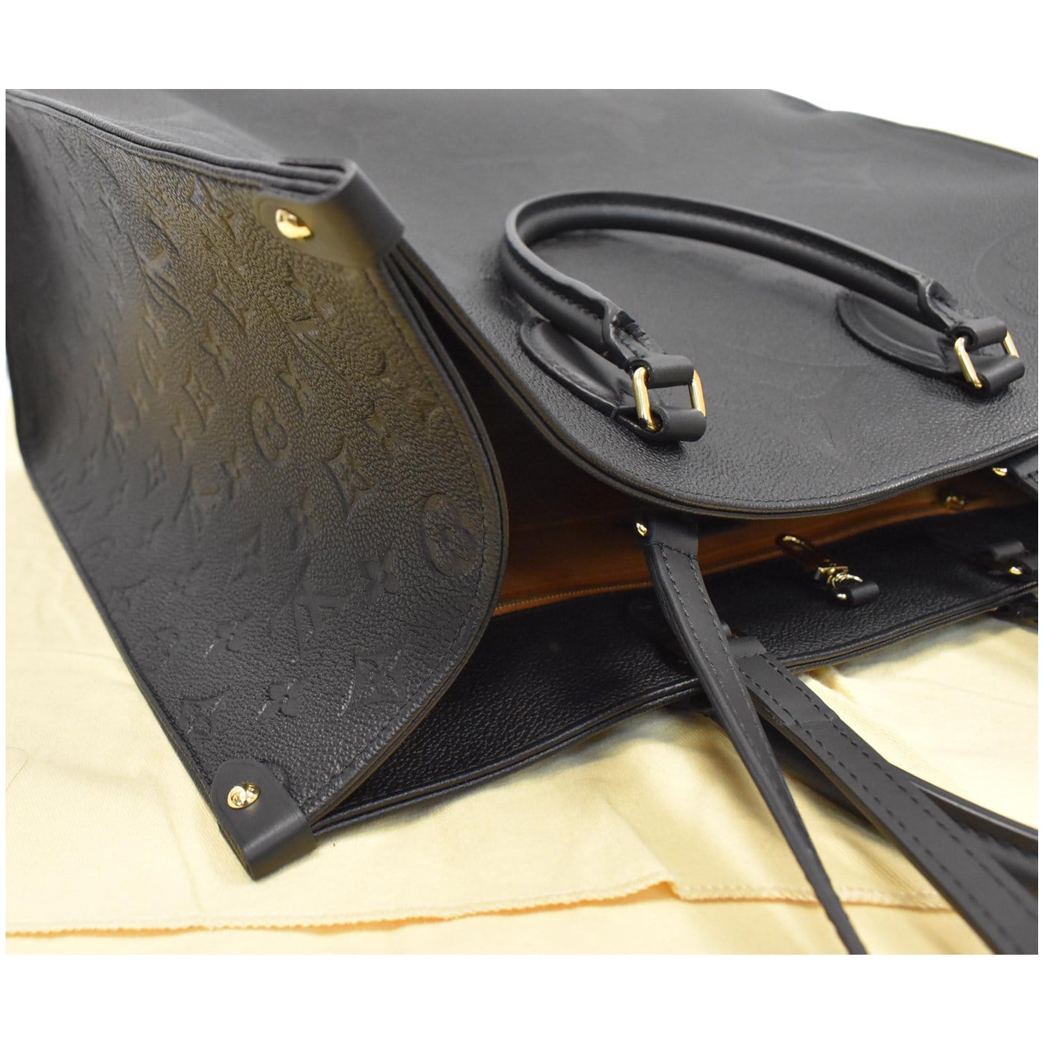 OnTheGo GM Bicolour Monogram Empreinte Leather - Handbags
