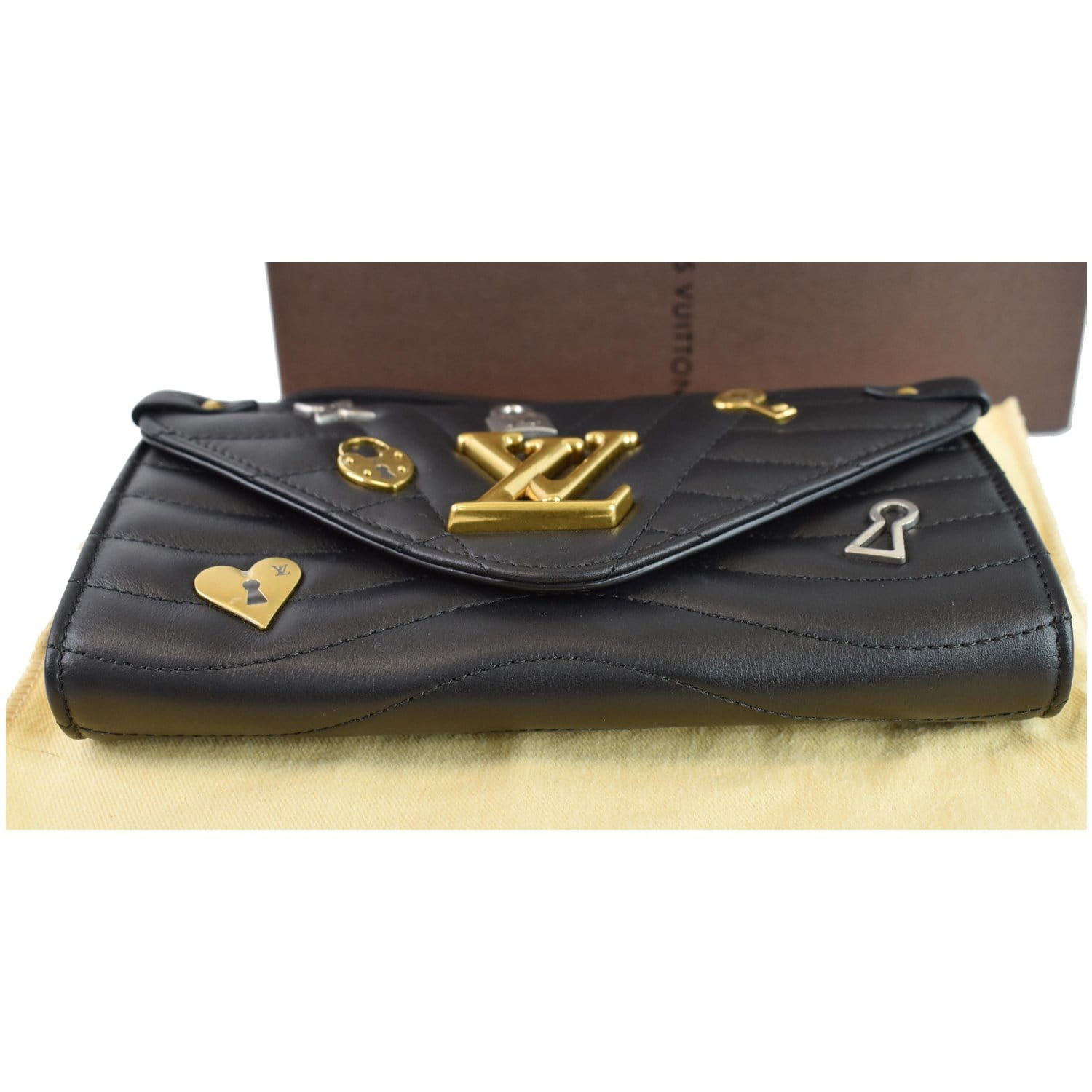 Louis Vuitton love lock heart bag charm, Luxury, Bags & Wallets on