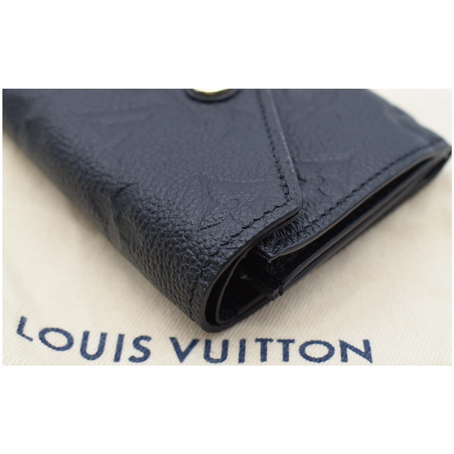 Louis Vuitton Empreinte Zoe Wallet Rose Poudre - MyDesignerly