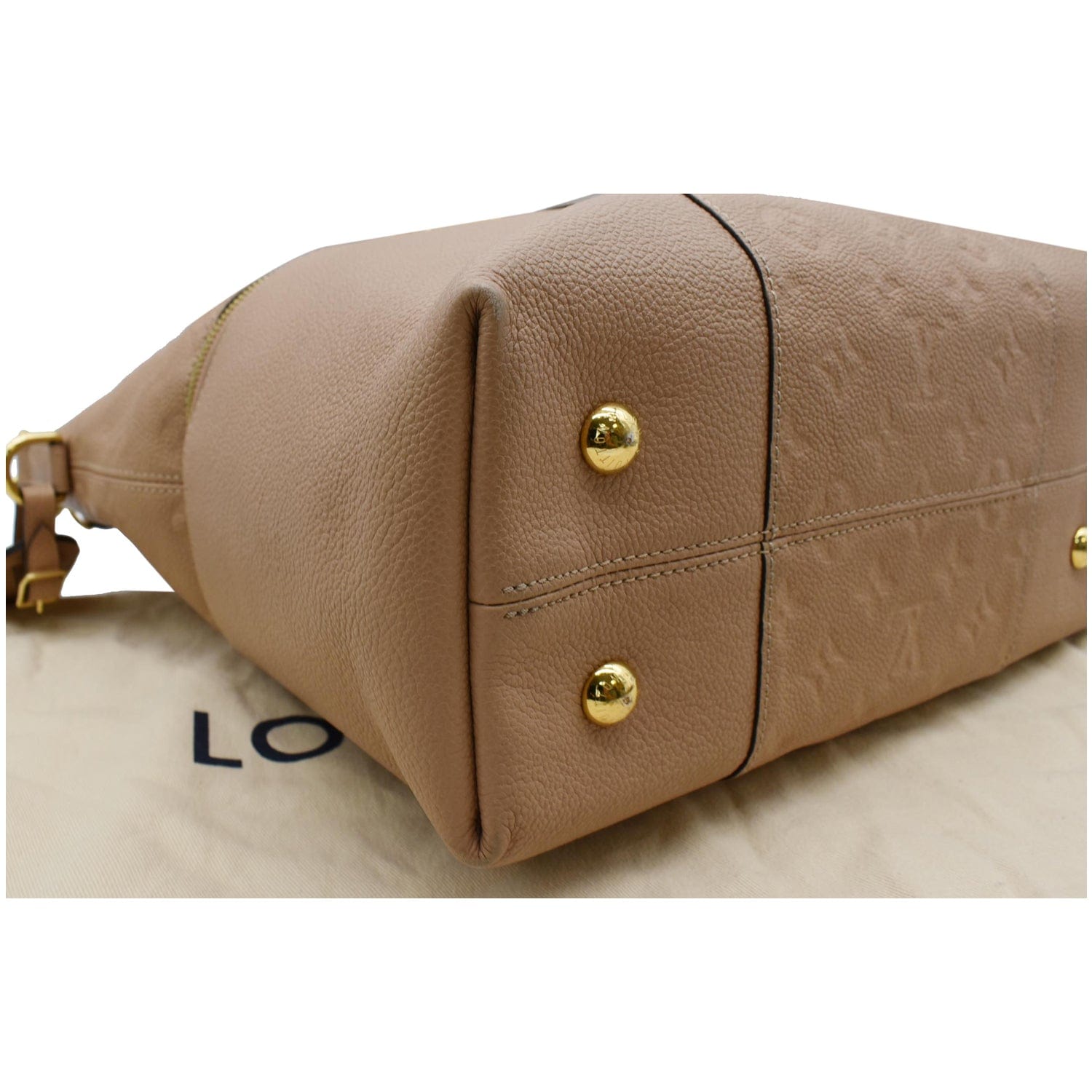 All about the neutrals! Shop this beautiful Louis Vuitton Empreinte  Bagatelle Hobo bag on www.mymoshposh.com!
