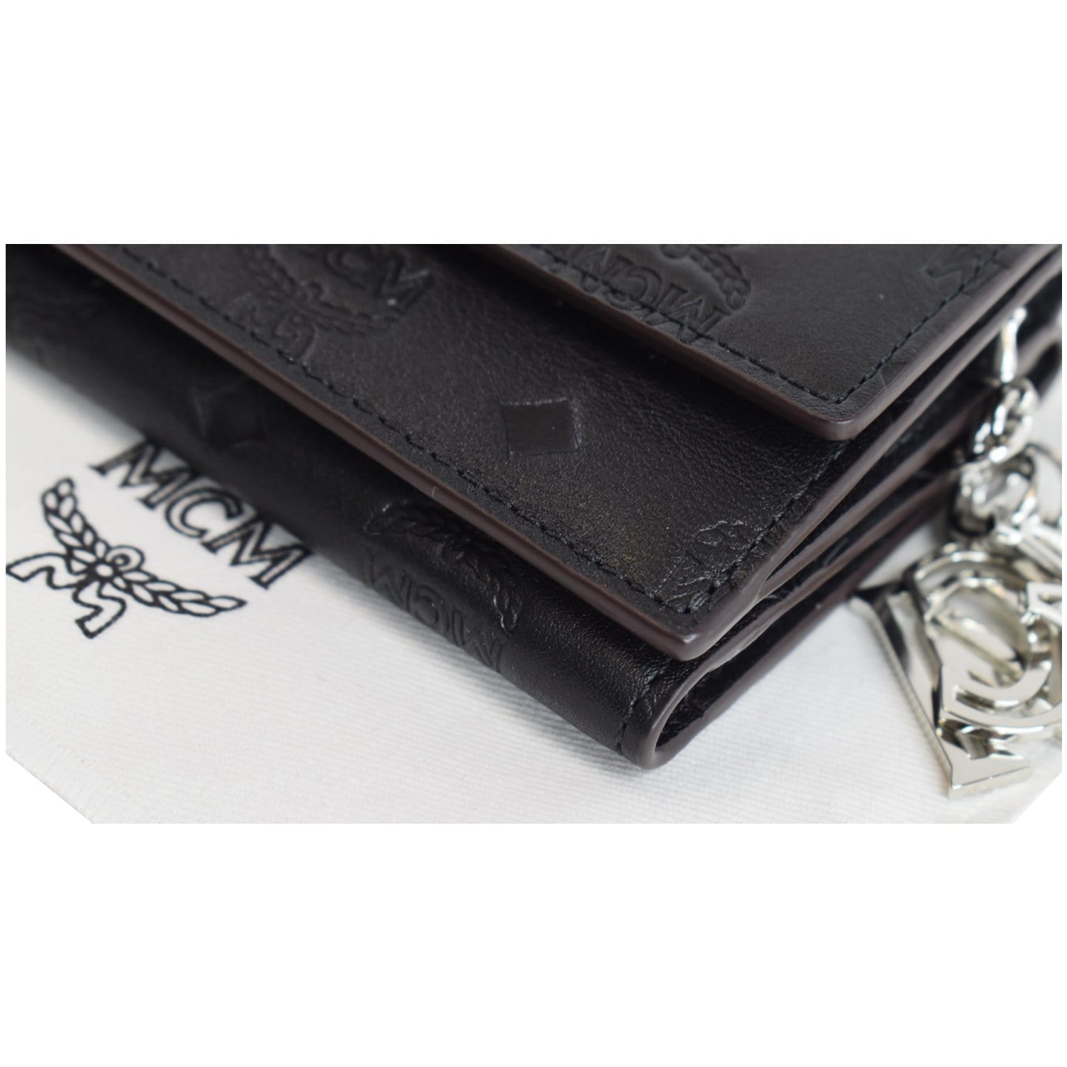 Mcm Embossed Leather Tri-Fold Mini Flap Wallet