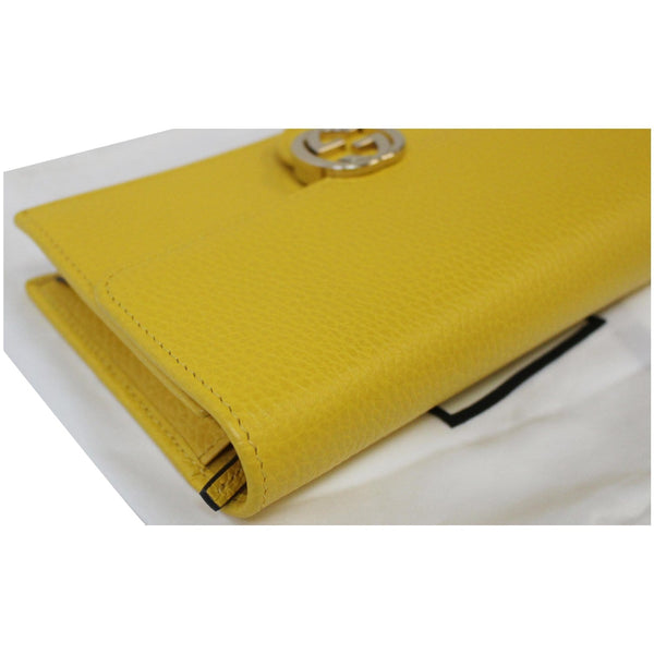 GUCCI GG Interlocking Pebbled Leather Crossbody Bag Yellow 615523