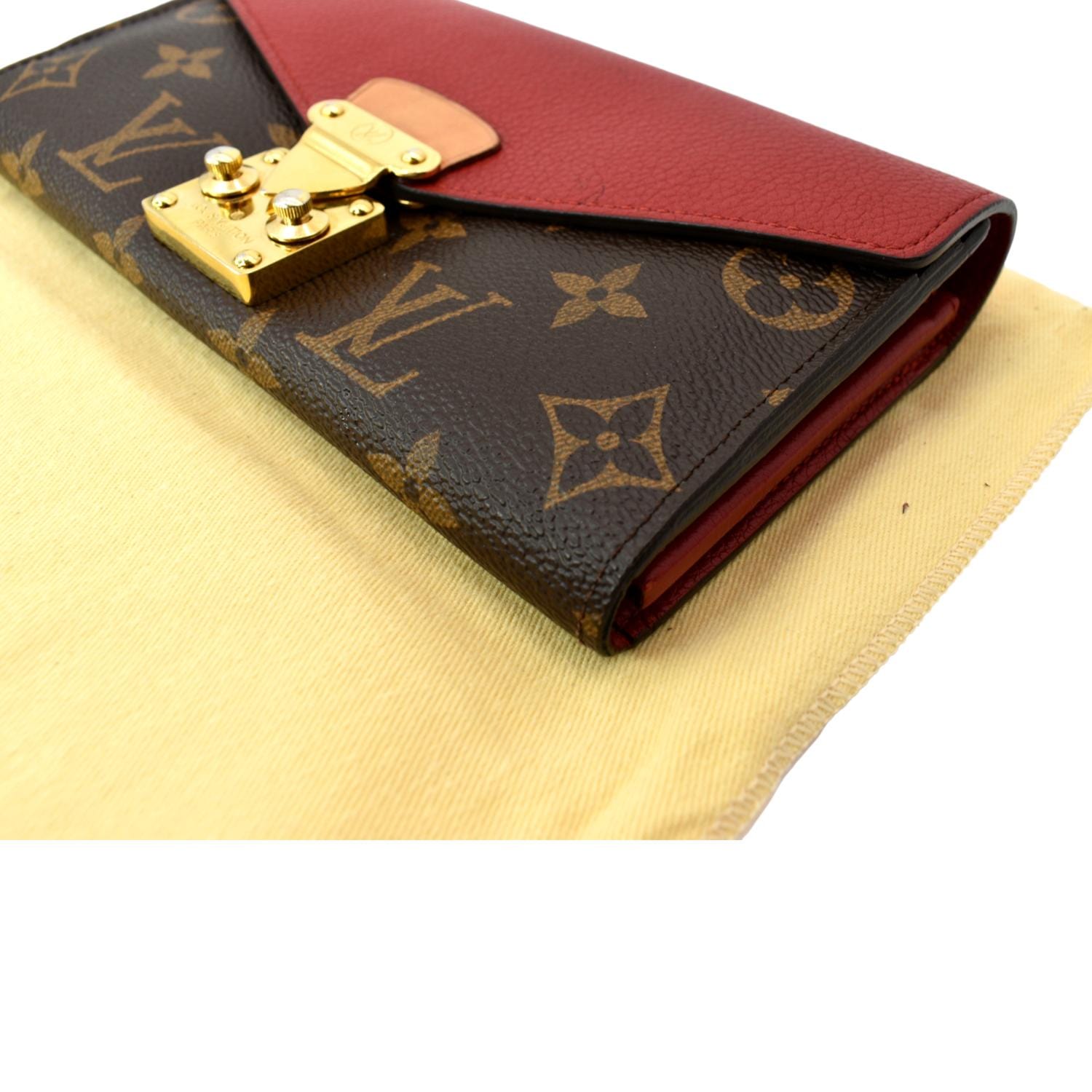 Sold at Auction: A Louis Vuitton Python Monogram Pallas Wallet